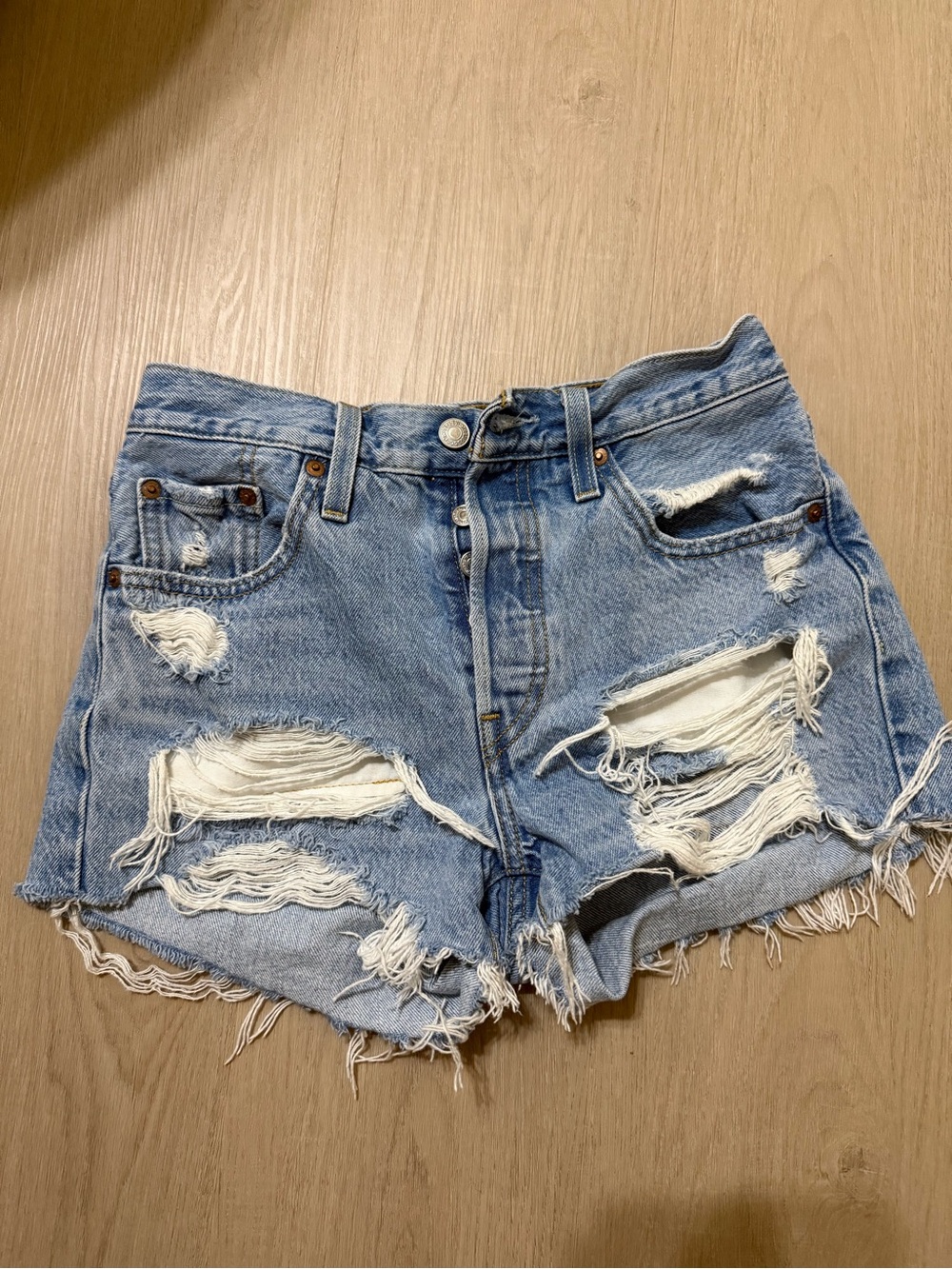 Levi’s 501 Distressed Light Blue Denim Cutoff Shorts size 25